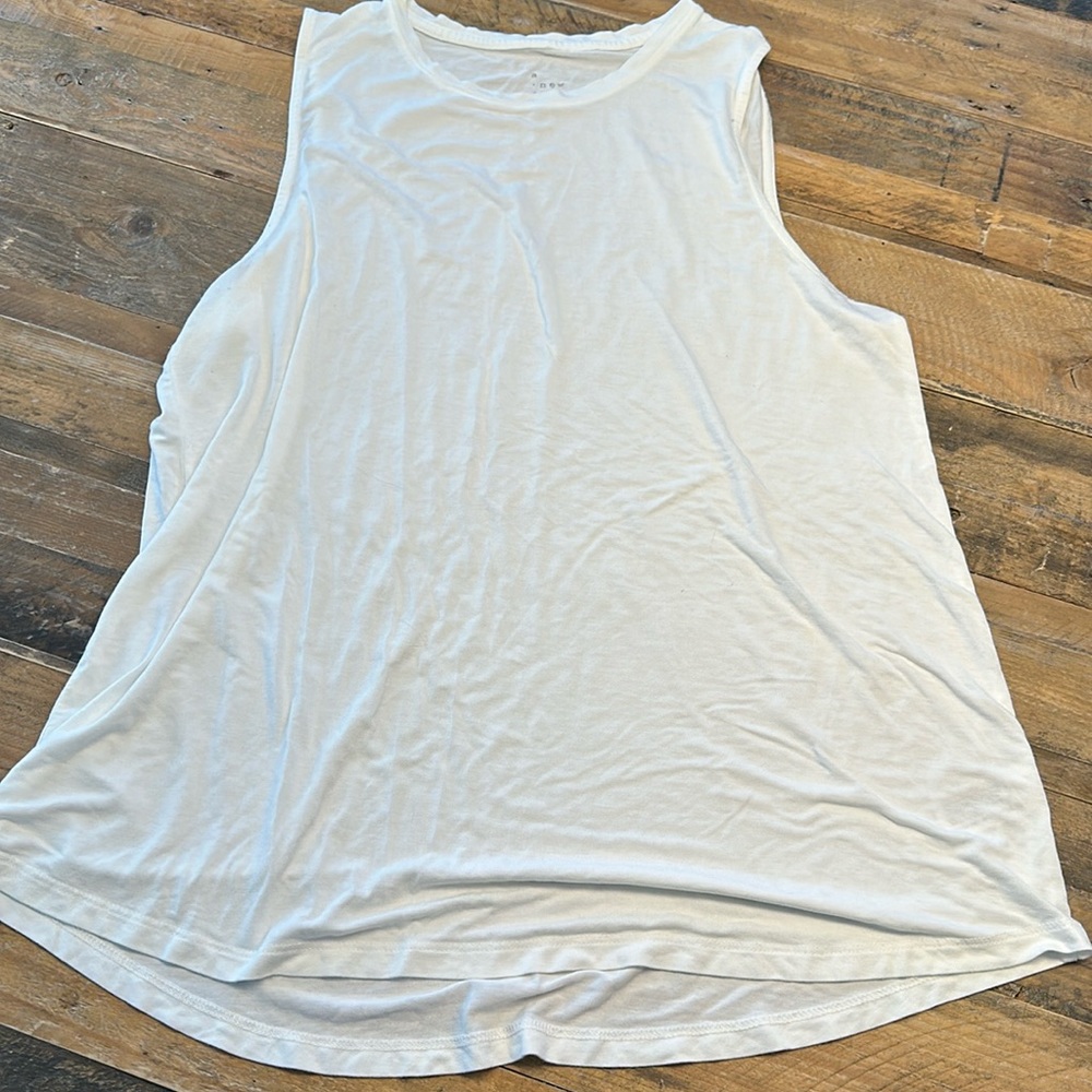 A new day long white tank